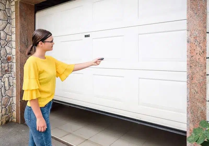 Our professional garage door technician is shown expertly servicing the door sensor, guaranteeing its accuracy and functionality. The service is carried out with precision and care, ensuring the safe and efficient operation of the garage door. With a keen focus on attention to detail, the technician ensures the sensor detects obstacles and functions as intended, providing reliable performance and preventing potential accidents.