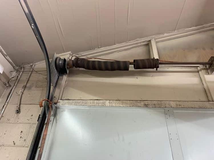 A garage door with a broken spring